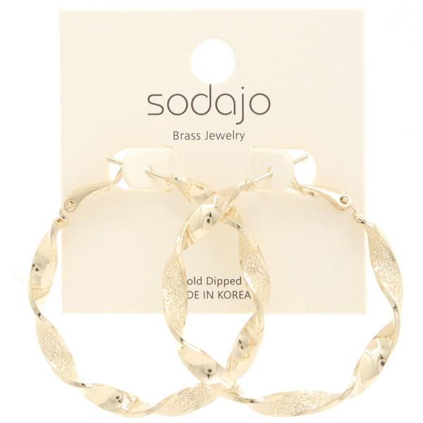 SODAJO TEXTURED METAL TWIST HOOP EARRING