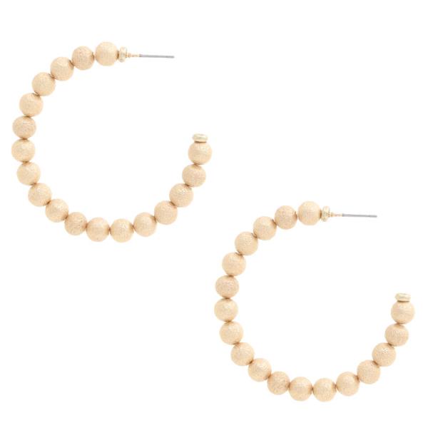 TEXTURED BEAD OPEN HOOP EARRING