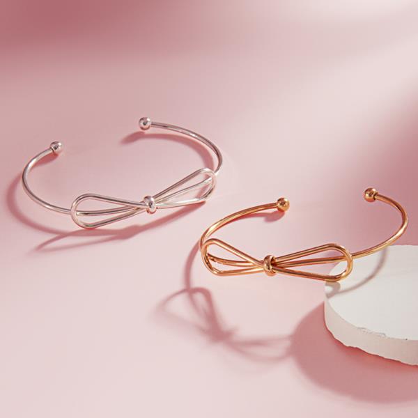 BOW SHAPED METAL CUFF BRACELET