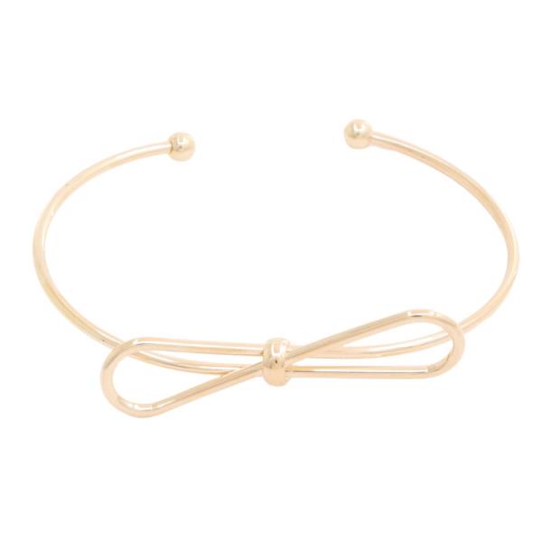 SODAJO GOLD DIPPED RIBBON BOW CUFF BRACELET