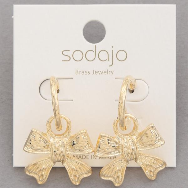 SODAJO TEXTURED RIBBON BOW GOLD DIPPED HOOP EARRING