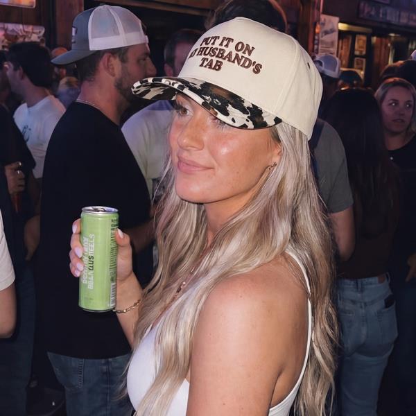 CC PUT IT ON MY HUSBAND TAB TRUCKER CAP