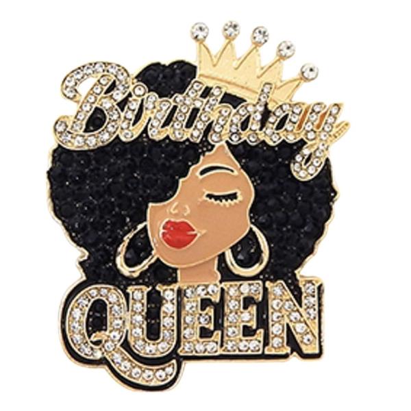 ENAMEL BROOCH FEATURING A BLACK WOMAN WITH AN AFRO, A CROWN, AND THE WORDS "BIRTHDAY QUEEN" IN CRYSTAL LETTERING