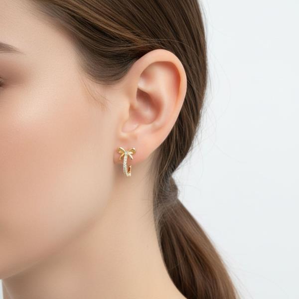 14K GOLD WHITE GOLD DIPPED CZ BOW HUGGIES